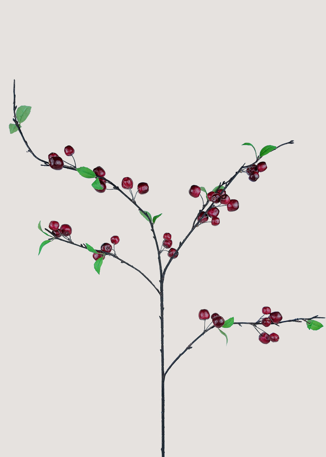 Artificial red apple branch with glossy fruits and green leaves – main view