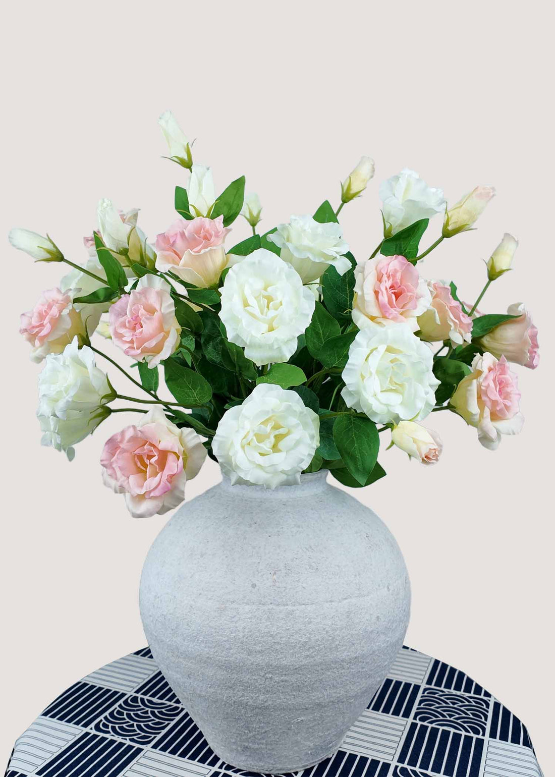 White and pink artificial lisianthus flower bouquet in vase