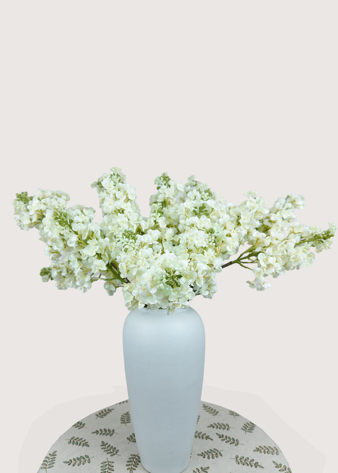 White artificial lilac bouquet with realistic faux flowers for home and wedding décor
