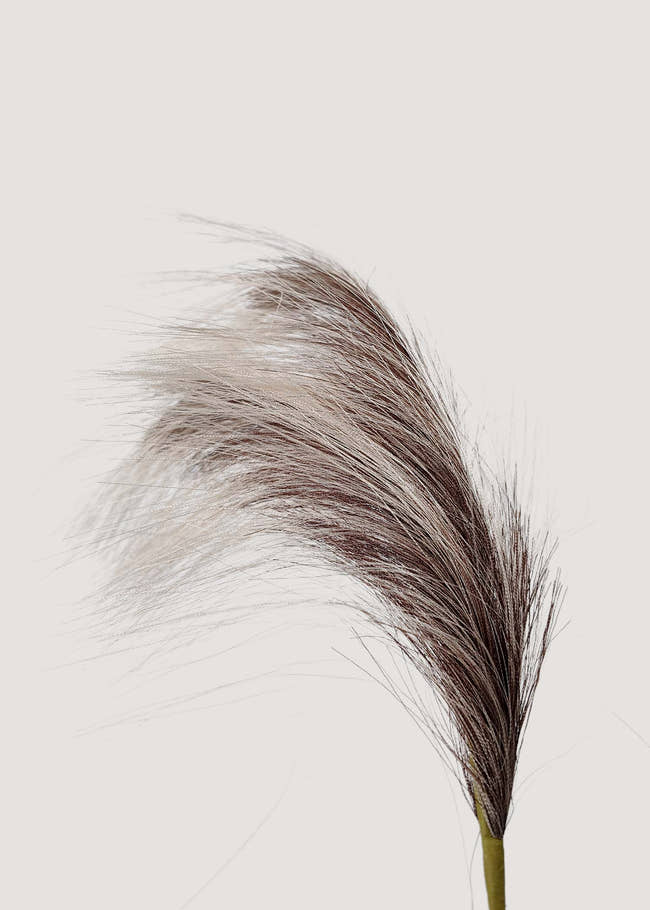 Close-up detail of realistic faux reed grass plume with natural texture