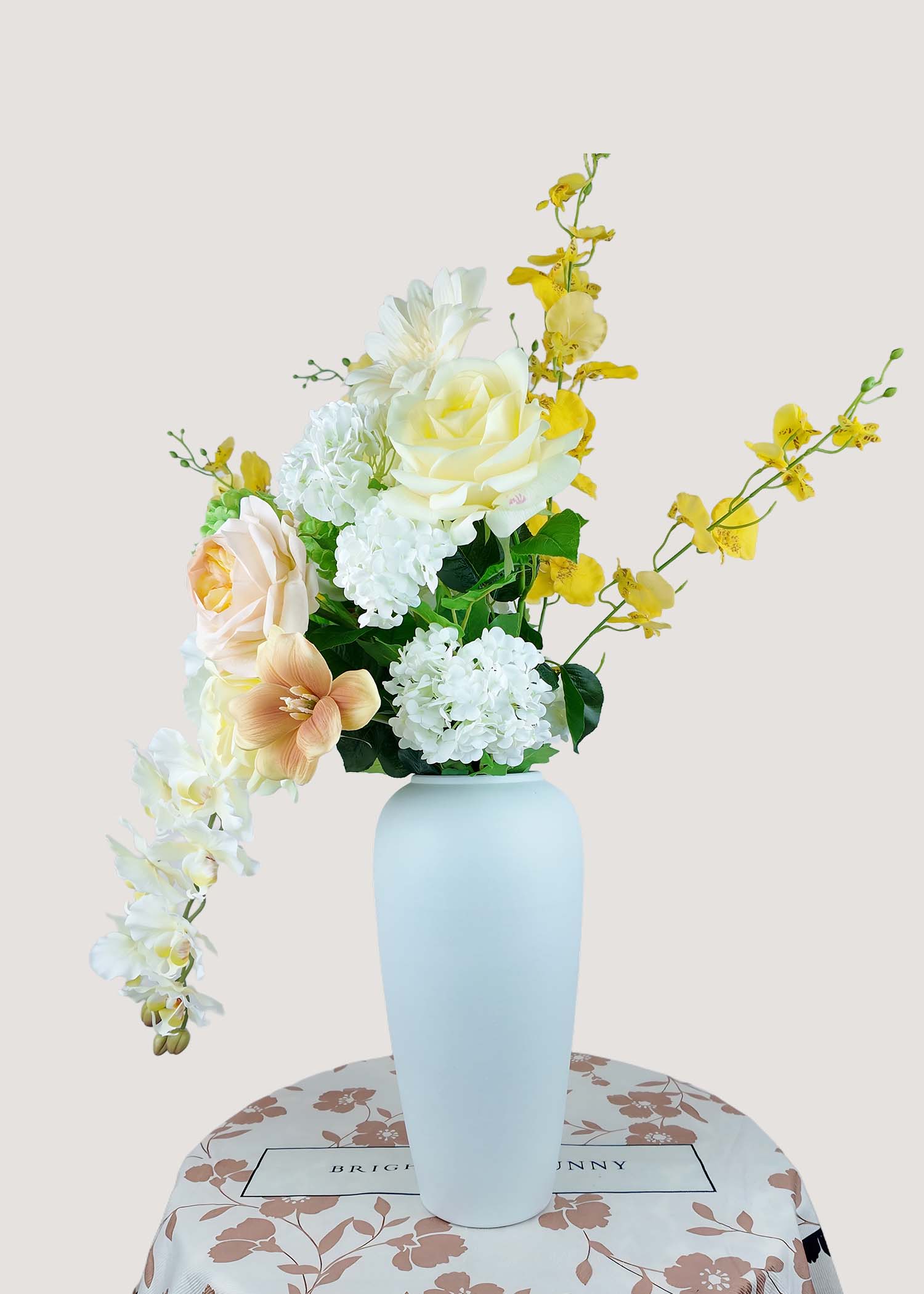 Back view of luxury silk flowers arrangement with orchids