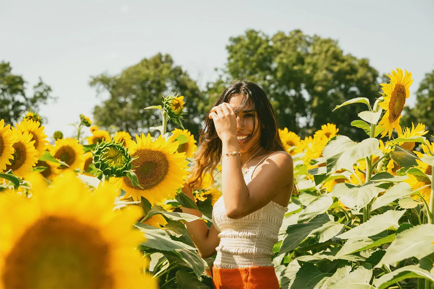 a-person-in-a-sunflower-field-spins-around