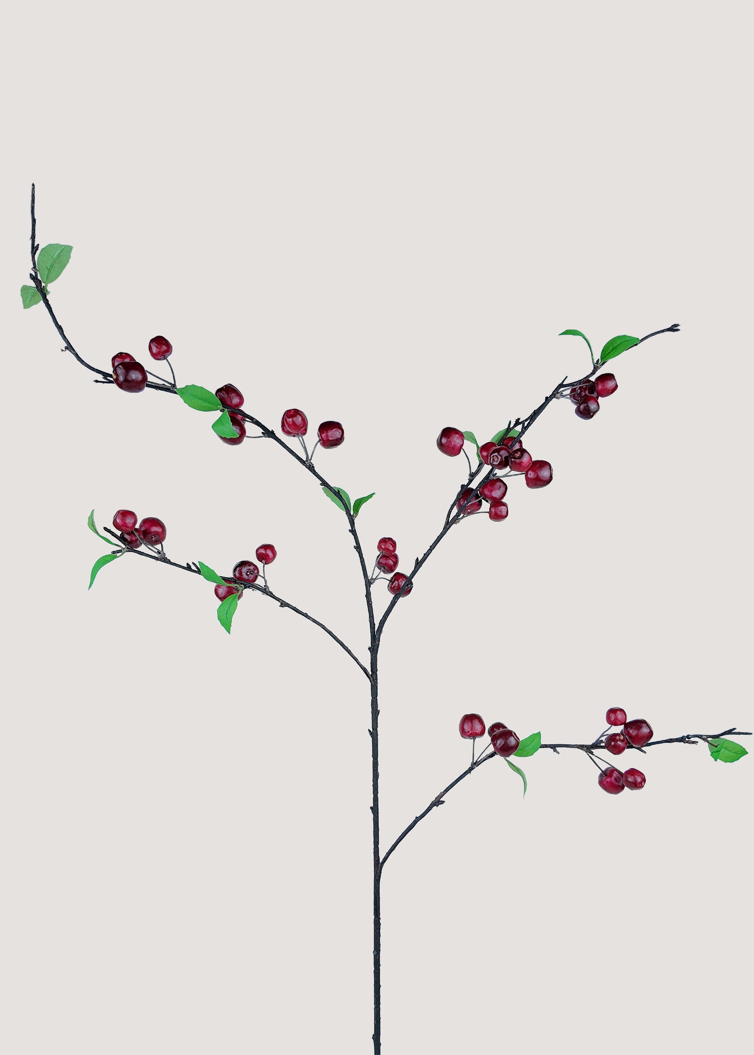 Artificial red apple branch with glossy fruits and green leaves – main view