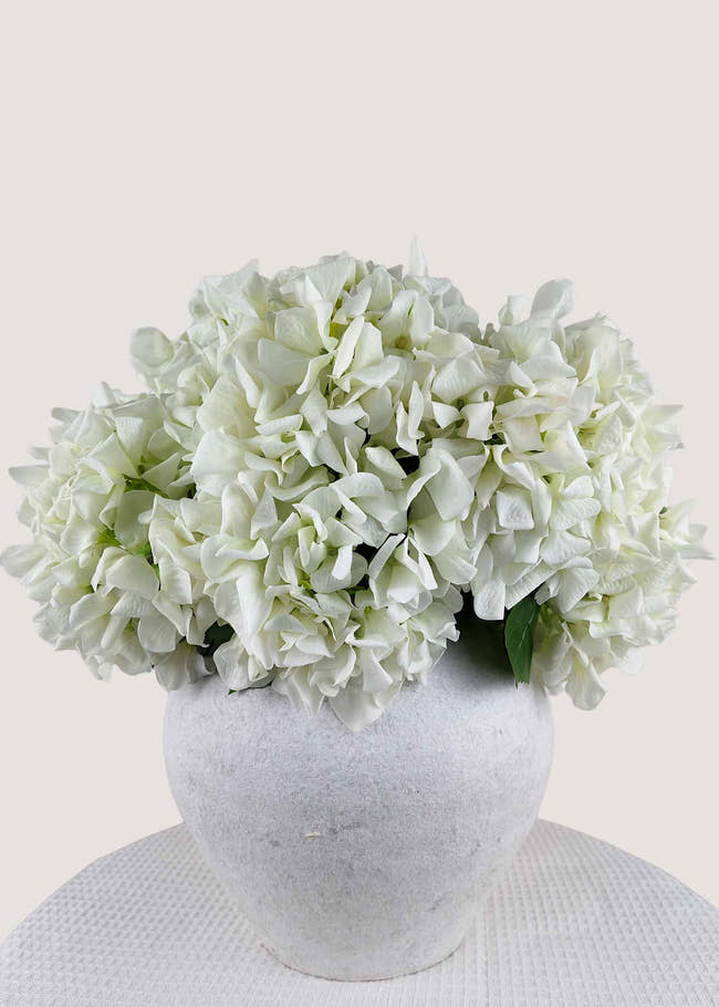Artificial white hydrangea bouquet with full faux blooms
