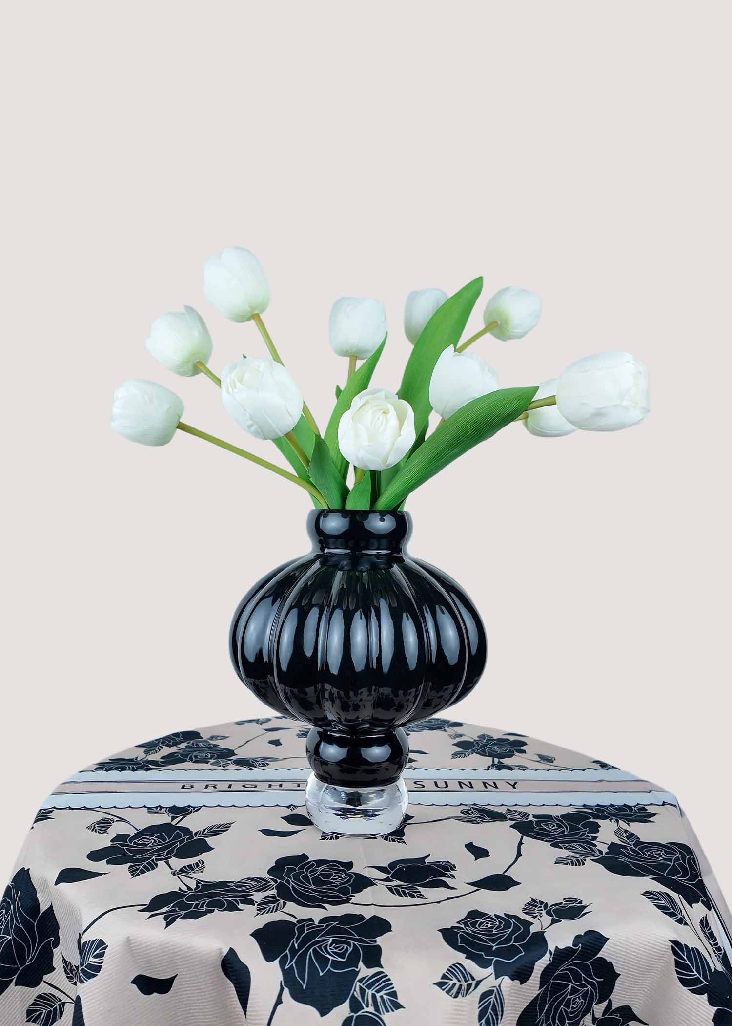 Artificial white tulip bouquet with multiple stems in realistic green leaves, faux flowers for home decor and weddings