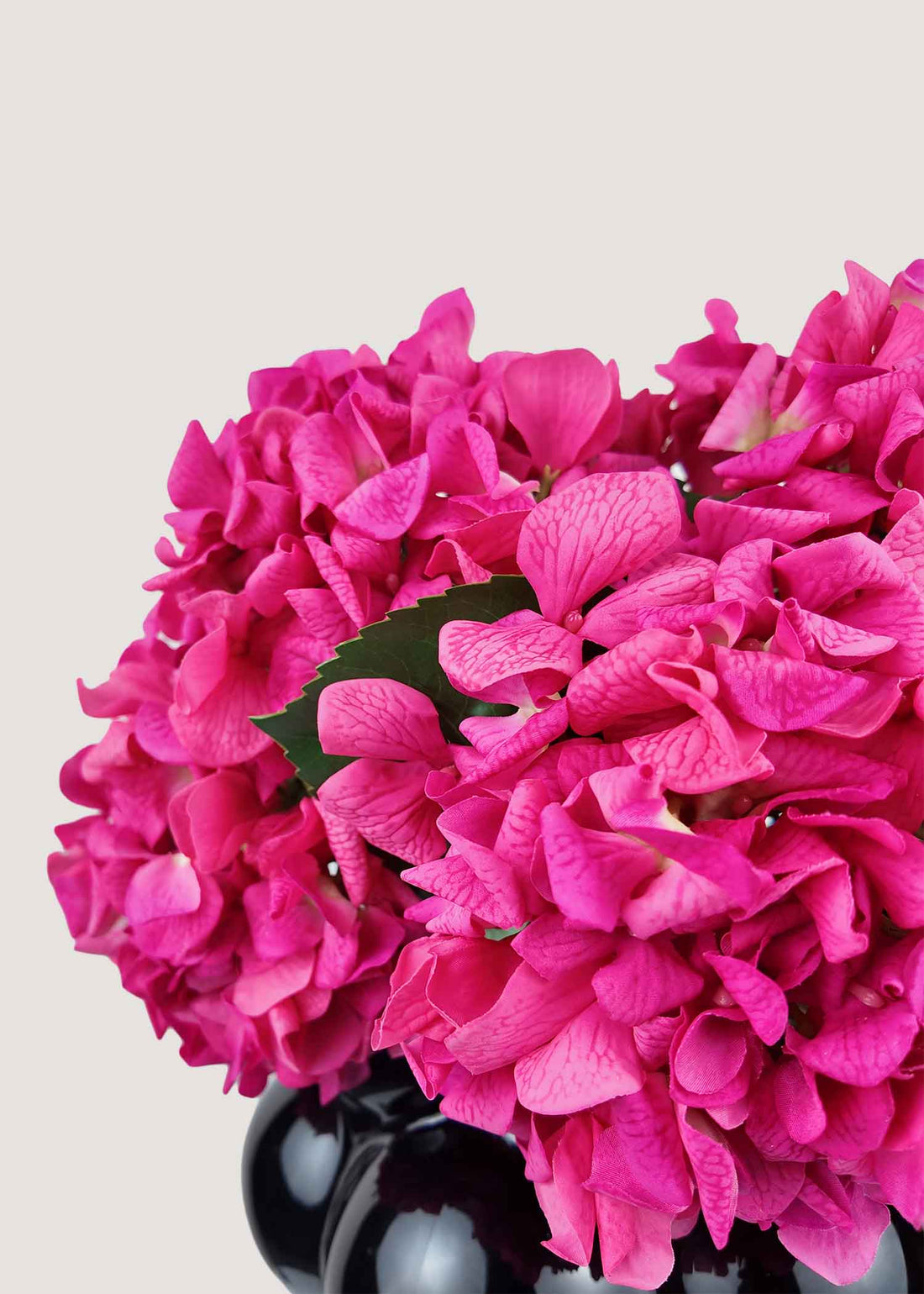 Close-up of realistic hot pink silk hydrangea petals