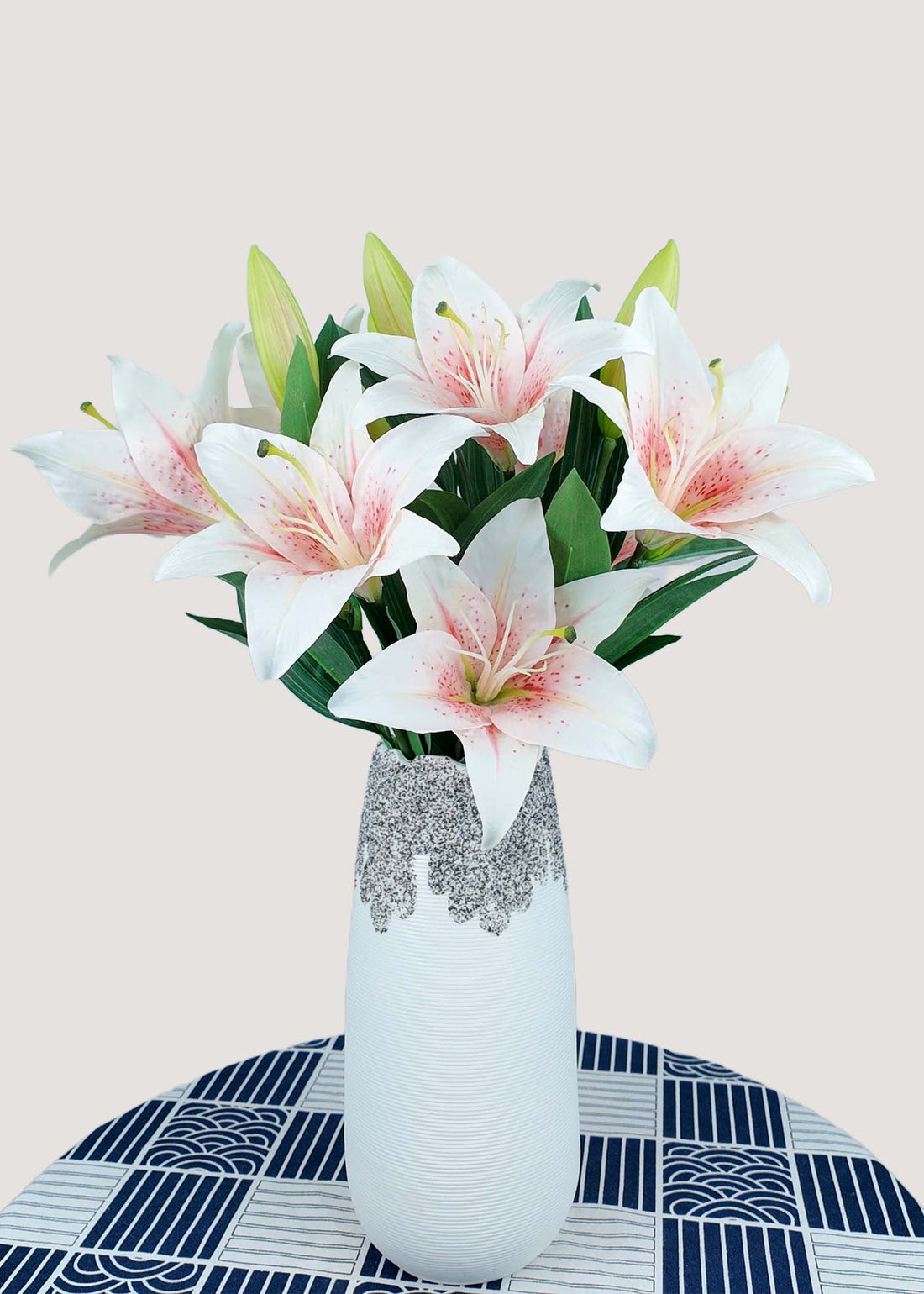 Pink and white faux lilies in vase elegant artificial flower arrangement