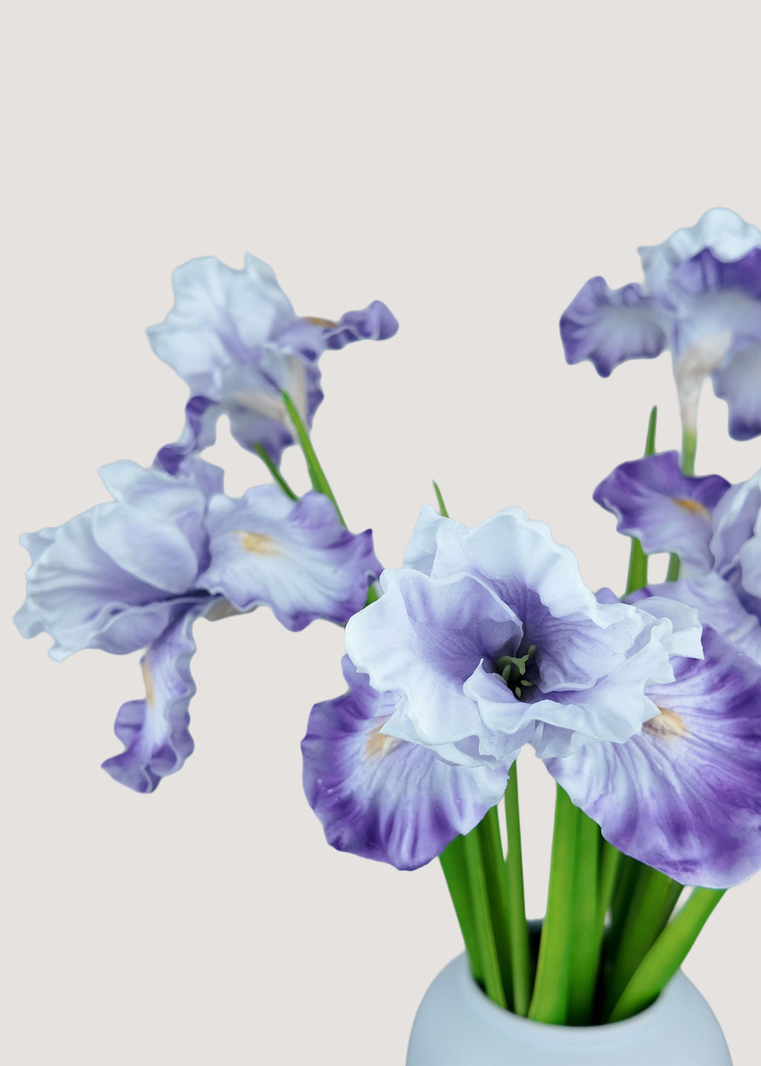 Close-up of realistic silk purple and white iris petals