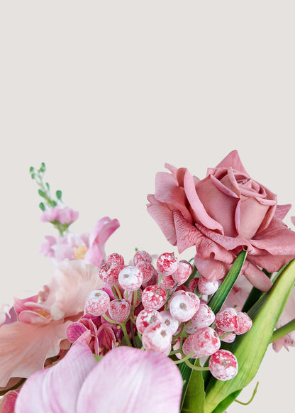 Close-up detail of Blush Romance artificial flower bouquet with faux pink rose, frosted berries, and soft petals