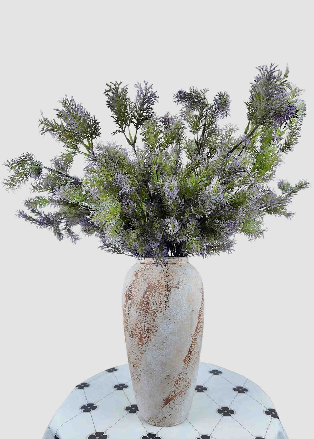 Frosted artificial bouquet in rustic vase, elegant faux floral arrangement for home décor