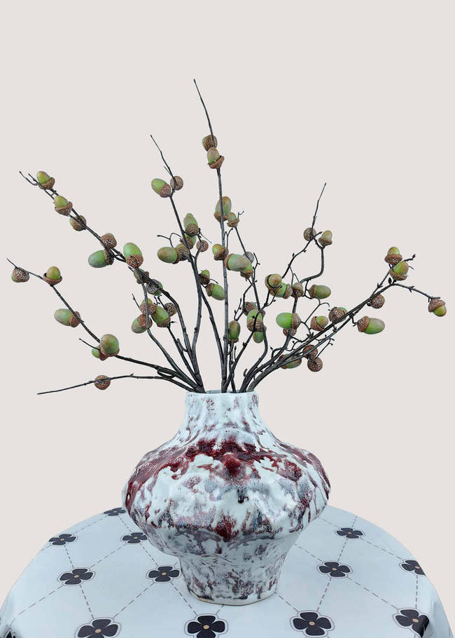 Rustic artificial acorn branch stems with green and brown accents