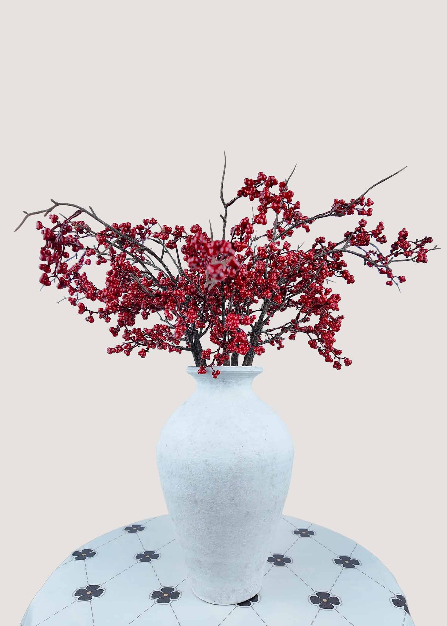 Artificial red berry bouquet for winter and Christmas décor