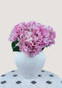 Pink artificial hydrangea bouquet with lush silk flowers in vase