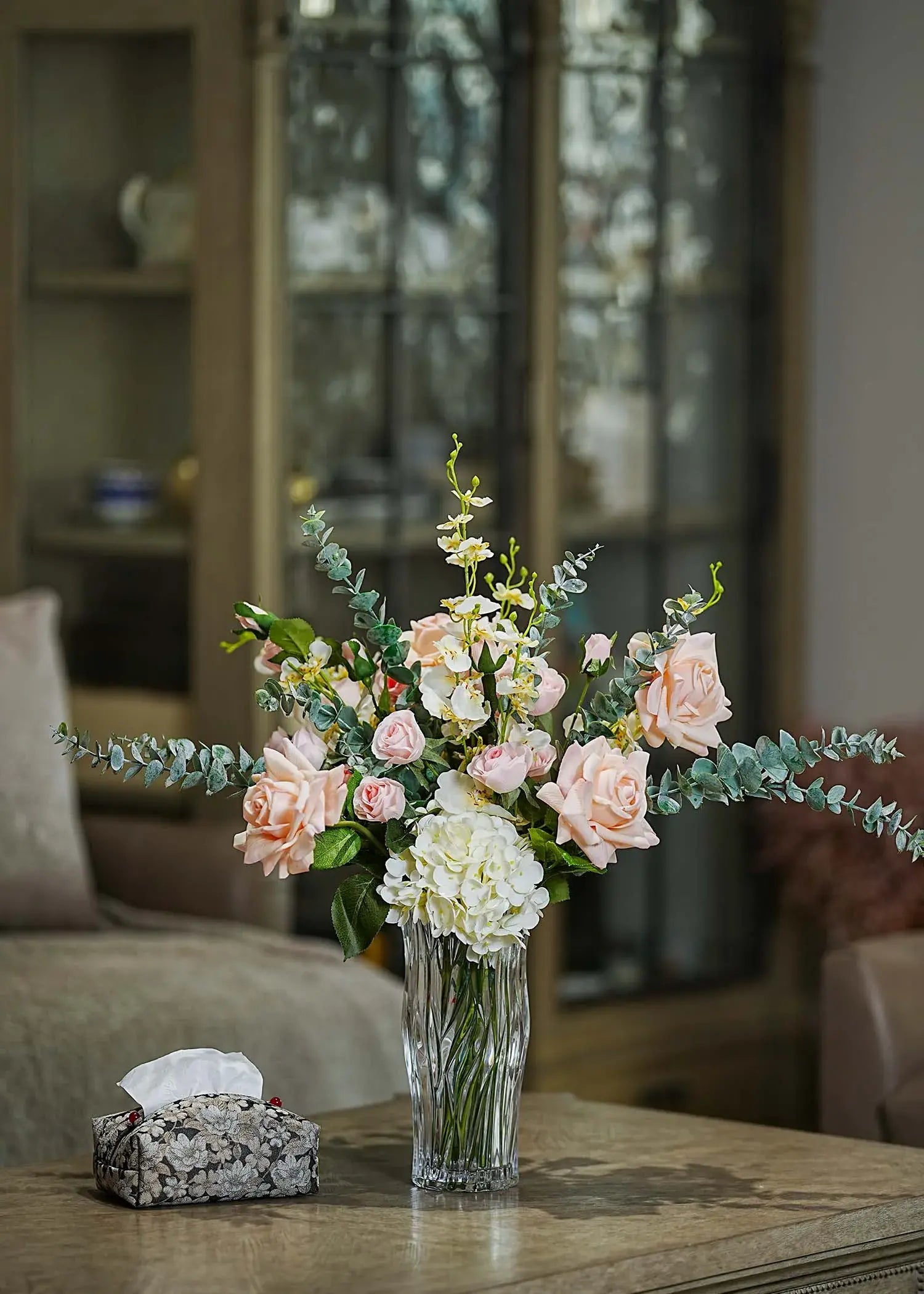 Real Touch blush roses and white hydrangea faux floral arrangement in a clear glass vase with eucalyptus leaves — Everblooma elegant home décor.