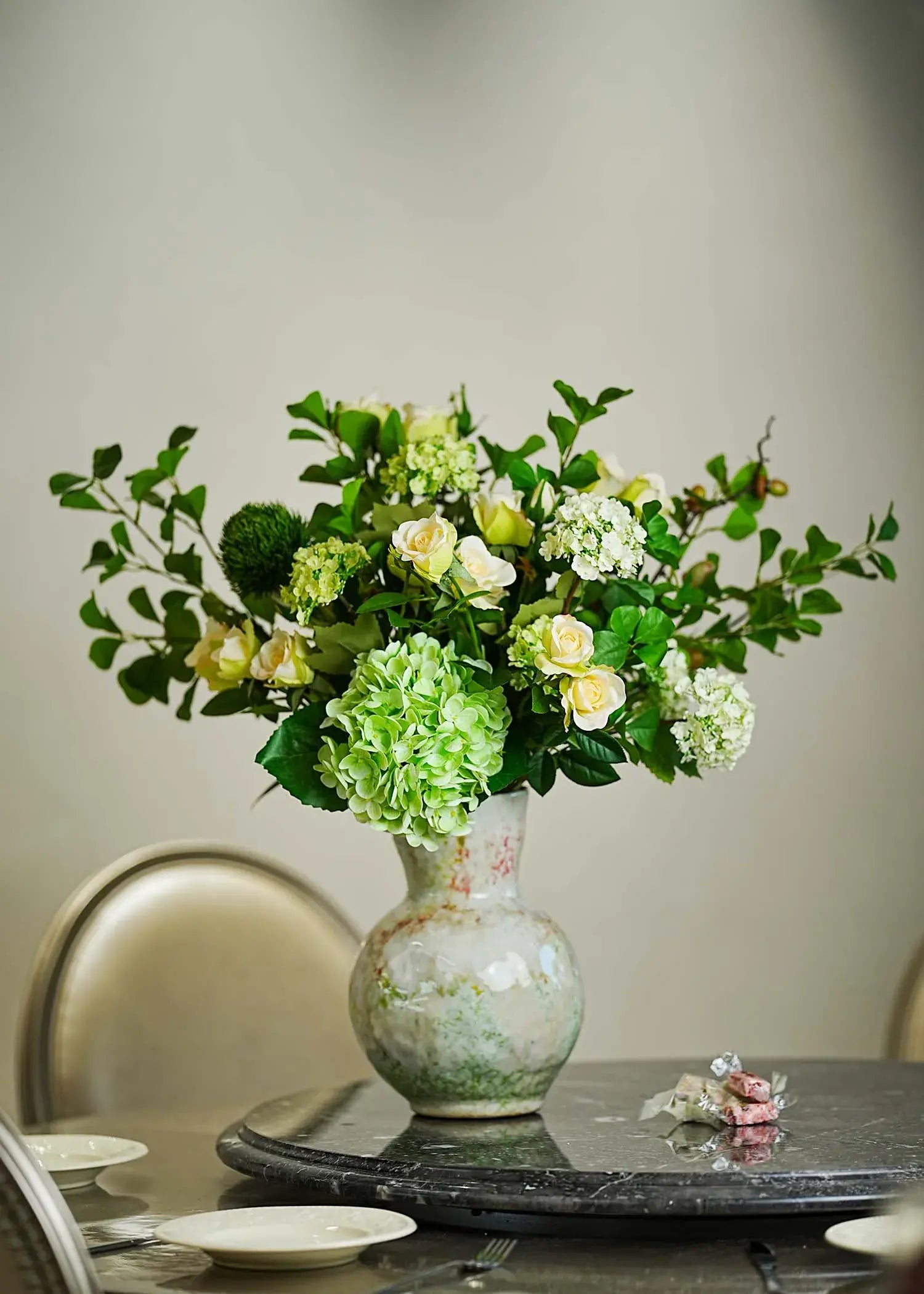 Real Touch green hydrangea and white rose faux floral centerpiece on a light wooden table — Everblooma elegant décor.