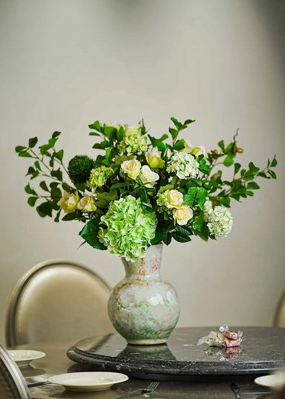 Real Touch green hydrangea and white rose faux floral centerpiece on a light wooden table — Everblooma elegant décor.