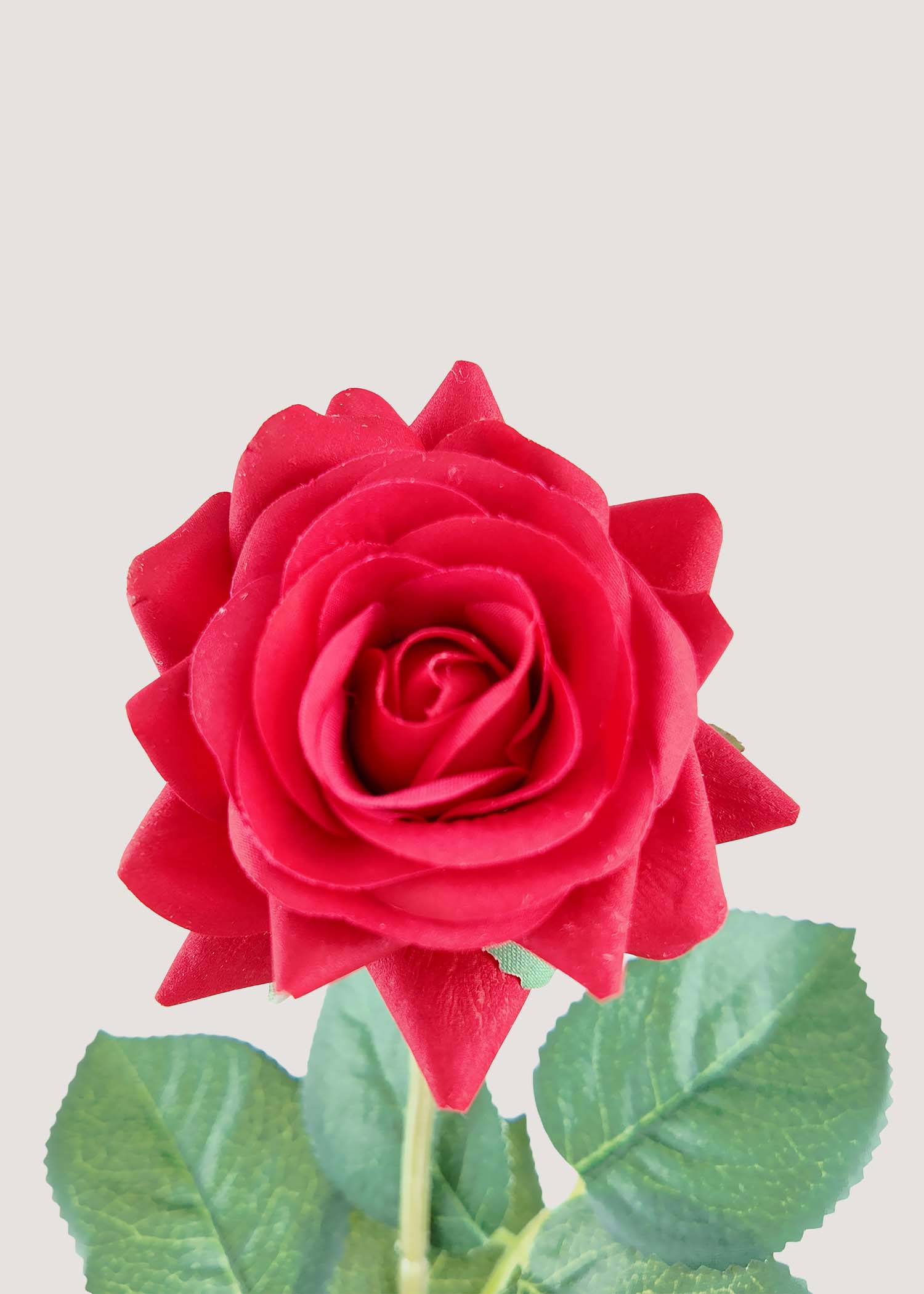 Close-up of real touch red rose petals artificial flowers